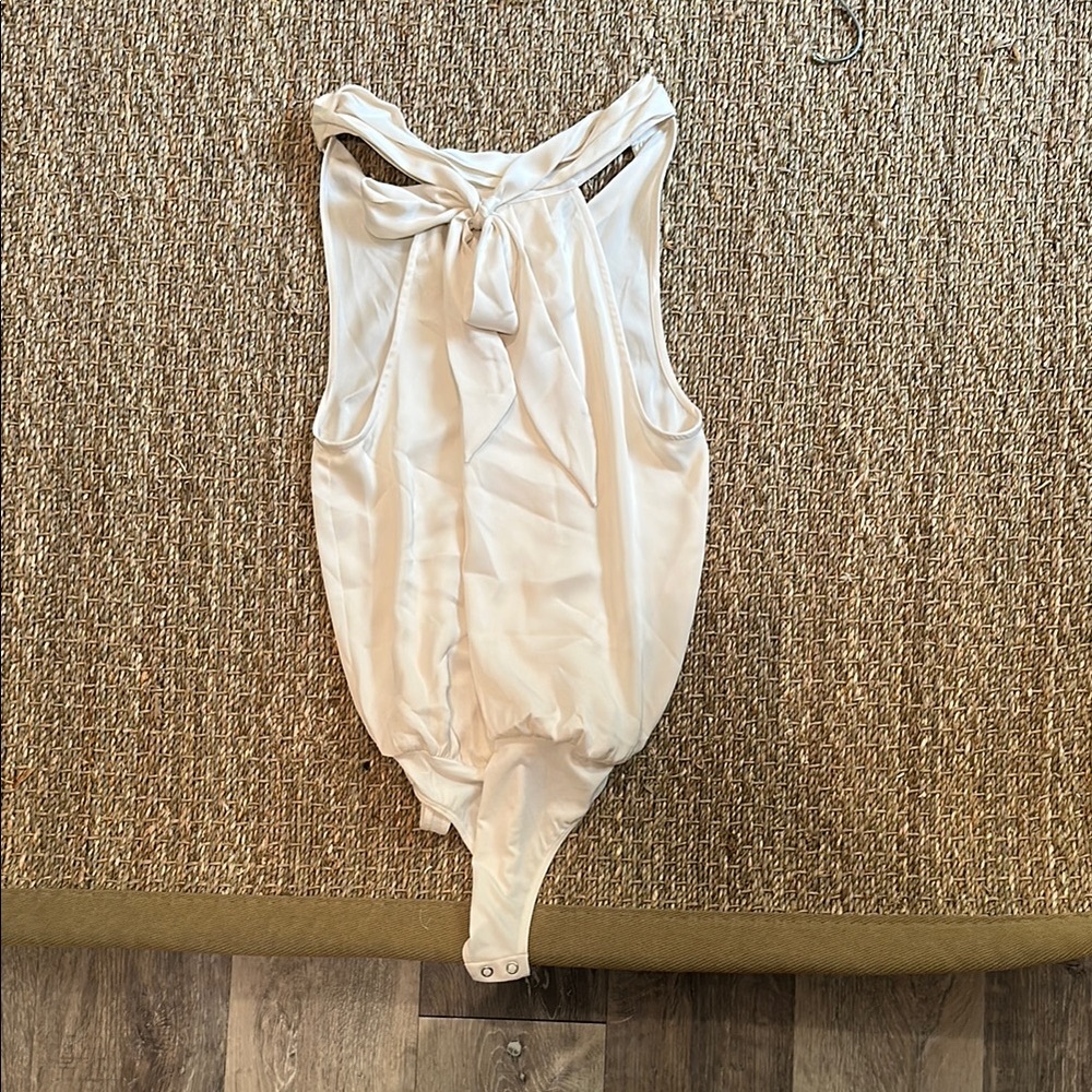 Elegant Cream Sleeveless Bodysuit